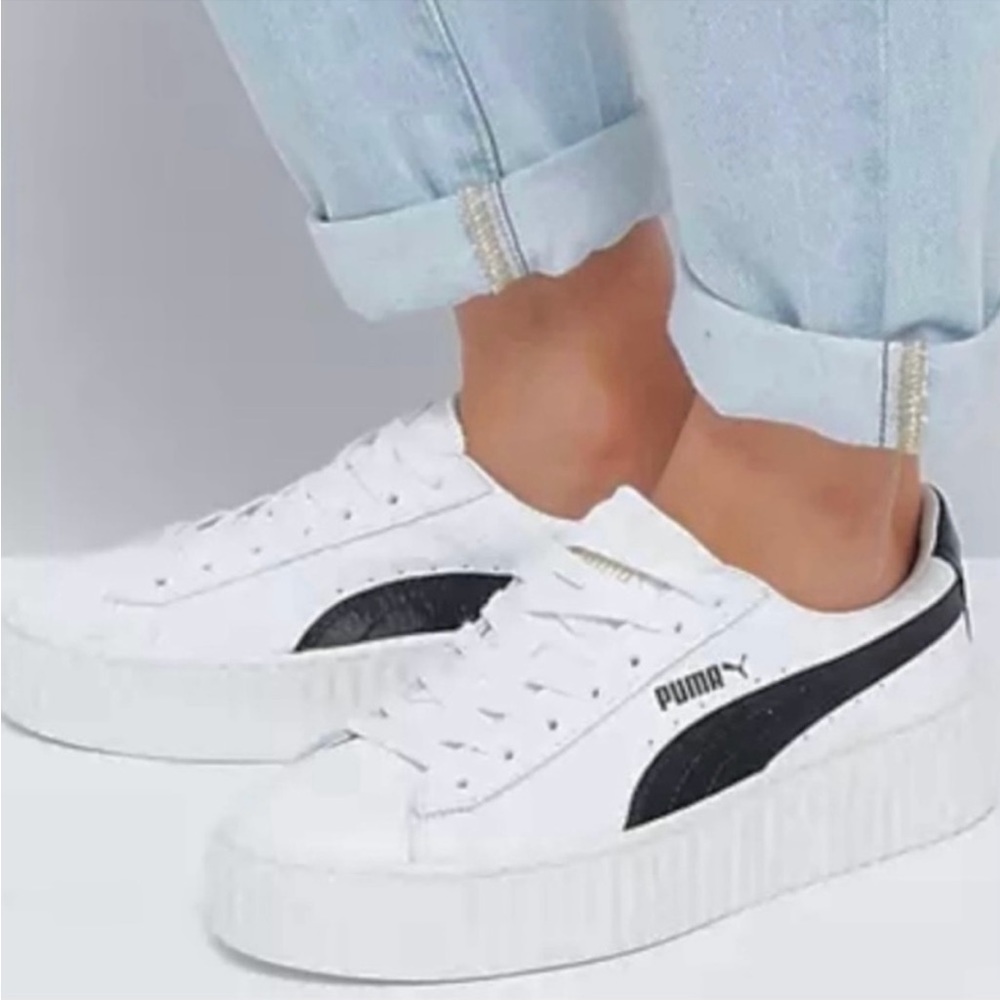 Size 6 Rihanna Puma leather sneakers. NWOT. 1 inch platform.